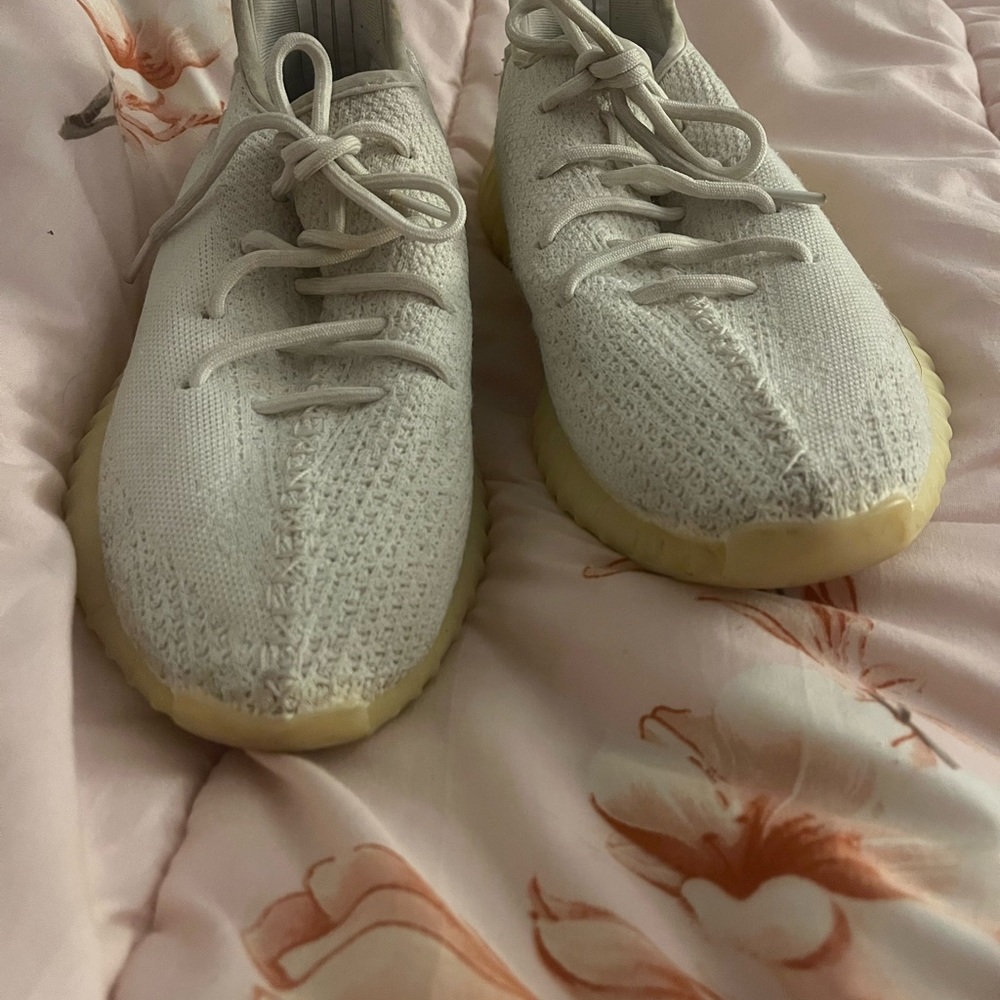 White colored Adidas Yeezys